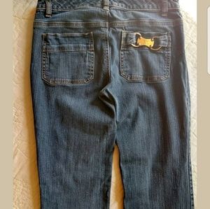 Michael Kors medium wash jeans w/ gold buckle